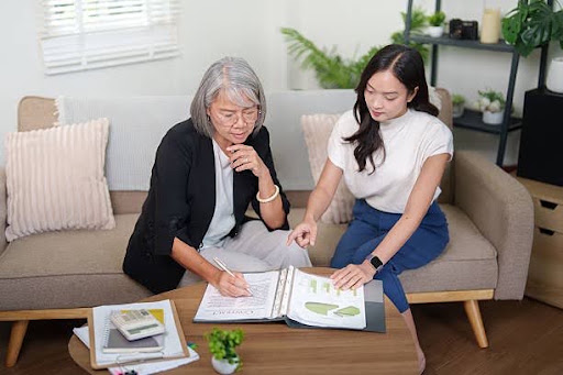 Wealth adviser helping a Malaysian client plan retirement with tax considerations